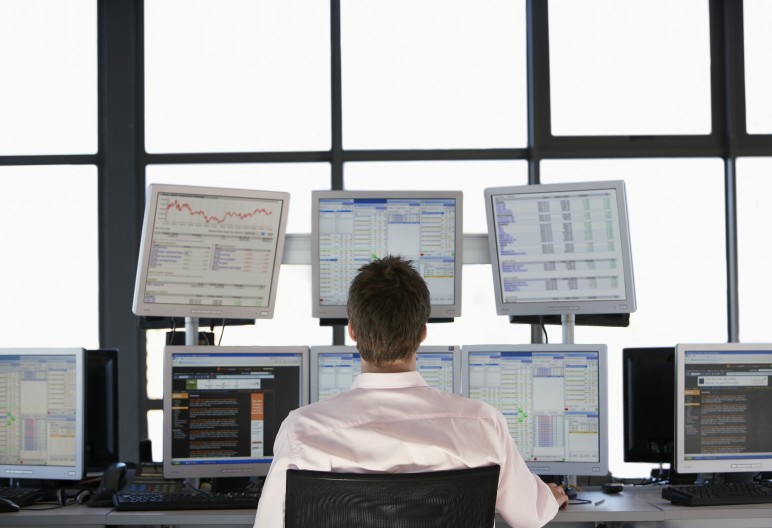 Businessmen Watching Data on Flat Panel Monitors